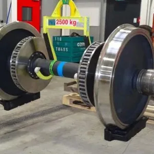Rubber protective pad for a pair of wheels