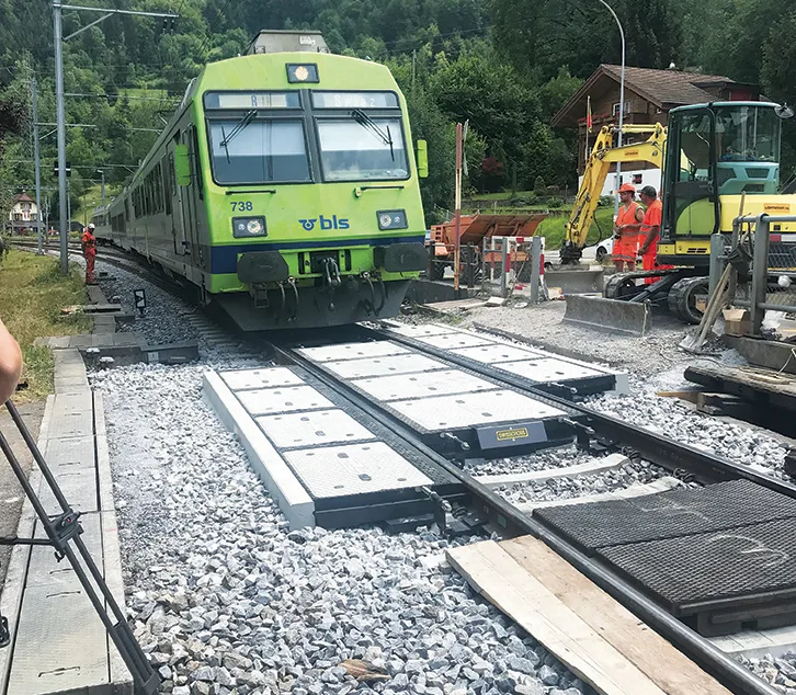 Concrete-rubber level crossing: RUBE